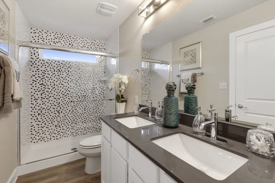 Representative furnished interior of a home built from the Houston by Pacesetter Homes in Village At Manor Commons, Manor (Image 13).