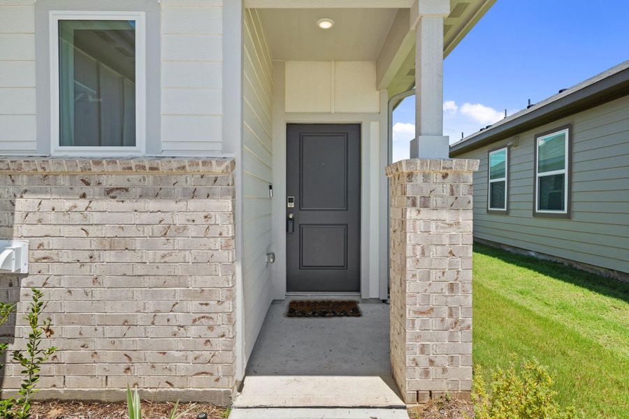 Exterior details and patio area of a home in Redbud, Hockley (Image 20).