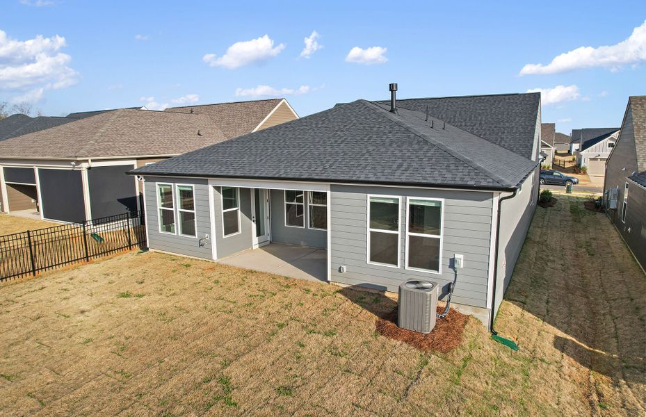 Exterior details and patio area of a home in Carolina Riverside, Belmont (Image 47).