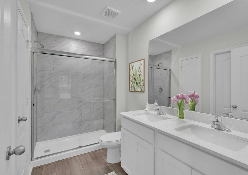 Get ready for your day in the master bathroom