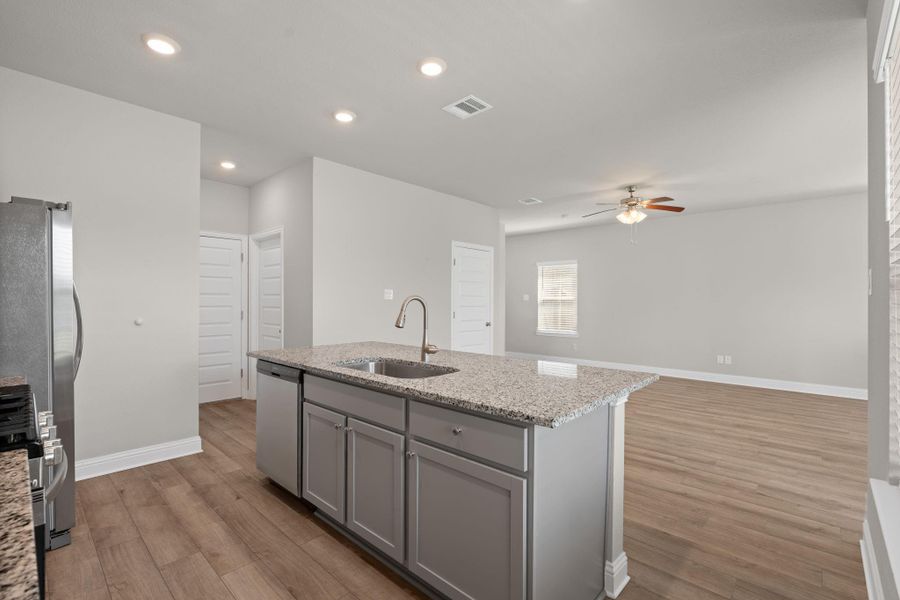 Furnished interior view inside a new home in Sunterra, Katy (Image 7).