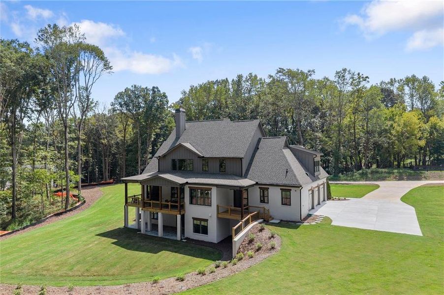 Front exterior of a new home in , Canton, GA, highlighting curb appeal (Image 34).