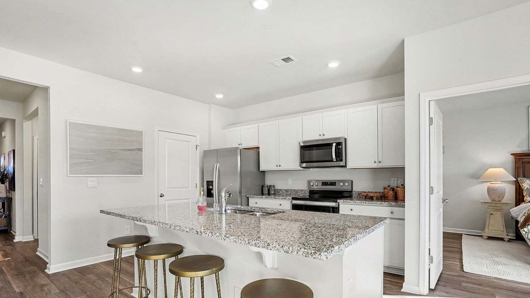 Representative furnished interior of a home built from the Aria by D.R. Horton in Meadow Walk, Loris (Image 8).