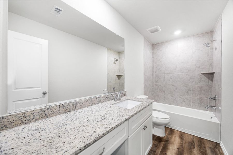 Furnished interior view inside a new home in Hill & Dale Ranch, Splendora (Image 8).