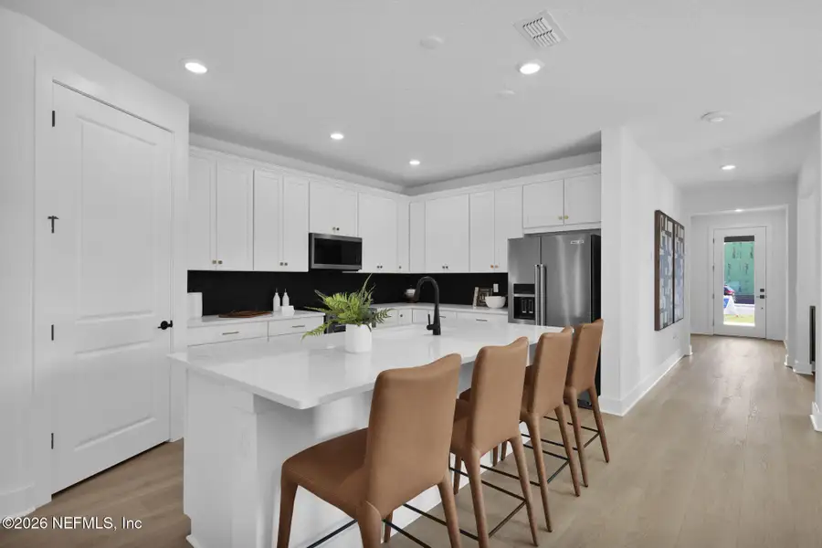 Furnished interior view inside a new home in Hyland Trail, Green Cove Springs (Image 8).