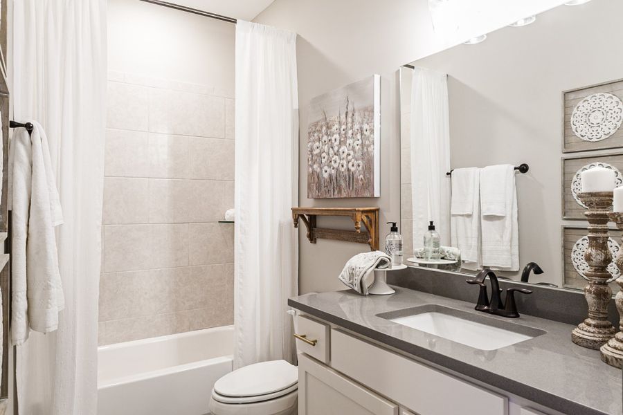 Representative furnished interior of a home built from the Bentley by Grant & Co in Manor at Hall Creek, Arlington (Image 7).