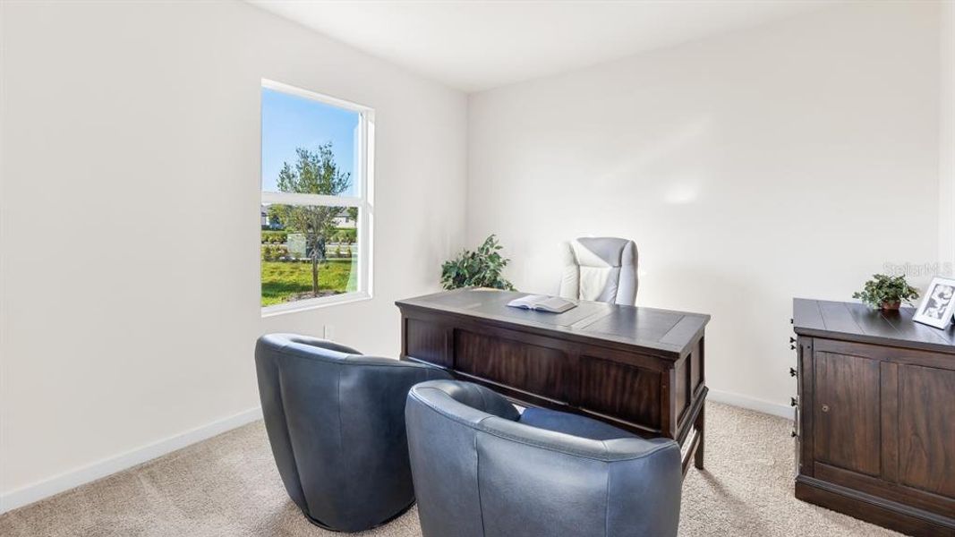 Furnished interior view inside a new home in Cove at West Port - Express, Port Charlotte (Image 15).