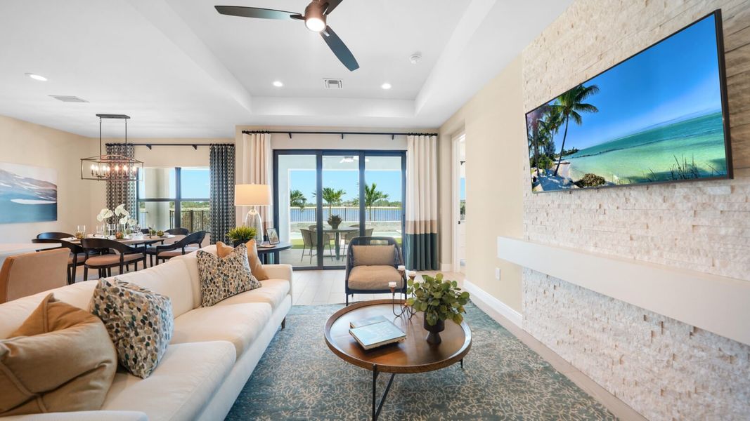 Representative furnished interior of a home built from the Meadow Brook by Neal Communities in SkySail, Naples (Image 6).