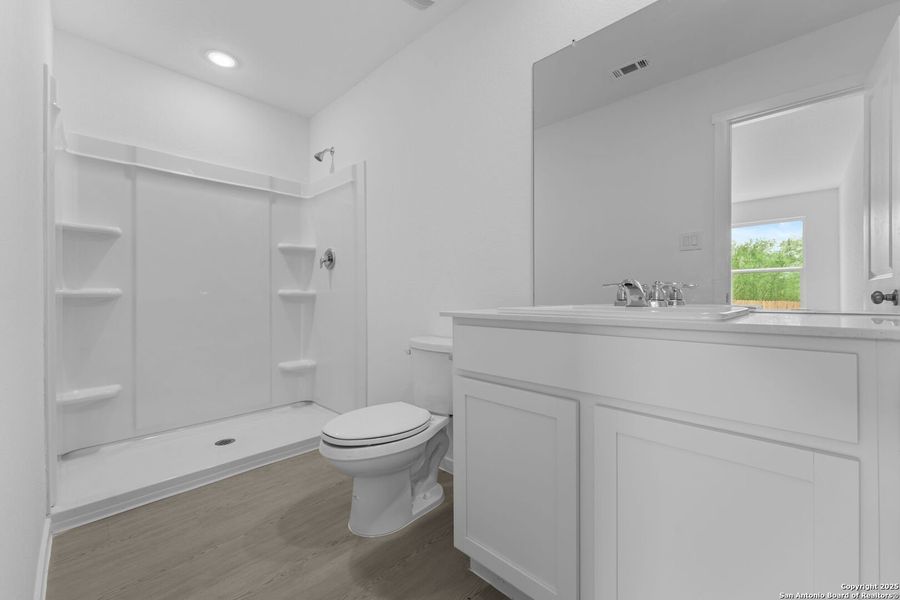 Furnished interior view inside a new home in Lodi Grove, Floresville (Image 3).