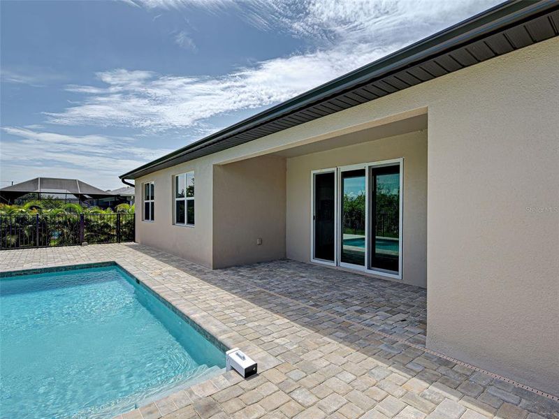 Exterior details and patio area of a home in , Port Charlotte (Image 16).