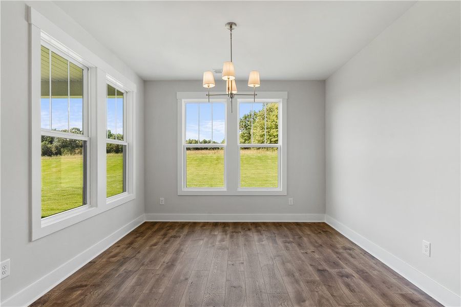 A well-lit interior space with numerous windows pr