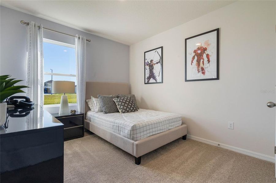 Furnished interior view inside a new home in Lake Deer Estates, Poinciana (Image 19).