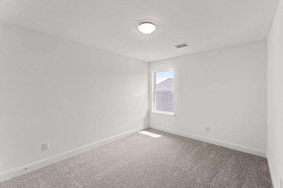 Representative unfurnished interior of a home built from the Tucker by UnionMain Homes in Elevon, Lavon (Image 22).