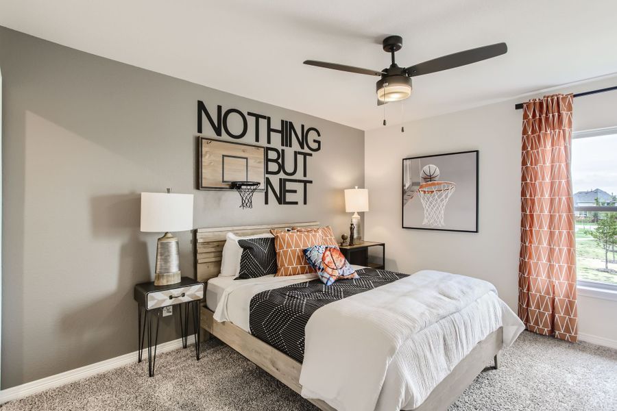 A bedroom with two beds.