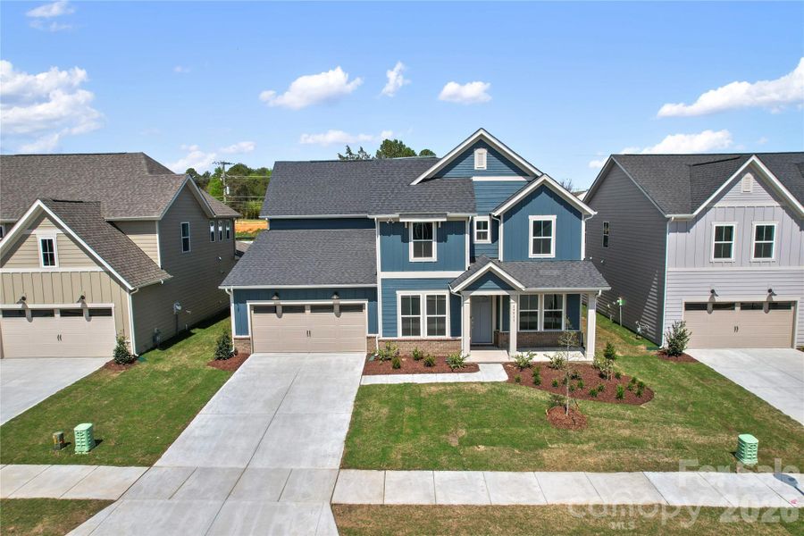 Front exterior of a new home in Parkside Crossing, Charlotte, NC, highlighting curb appeal (Image 24).