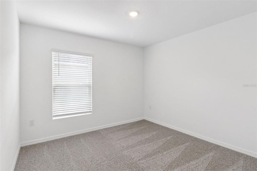 Spacious, unfurnished interior of a new home in Bradbury Creek, Haines City (Image 22).