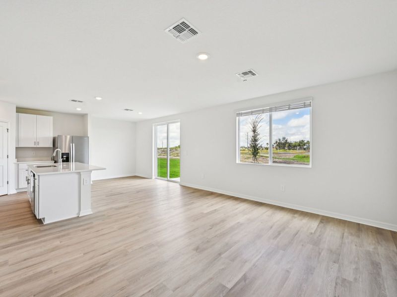 Spacious, unfurnished interior of a new home in Oakfield Trails - Premier Series, Parrish (Image 6).