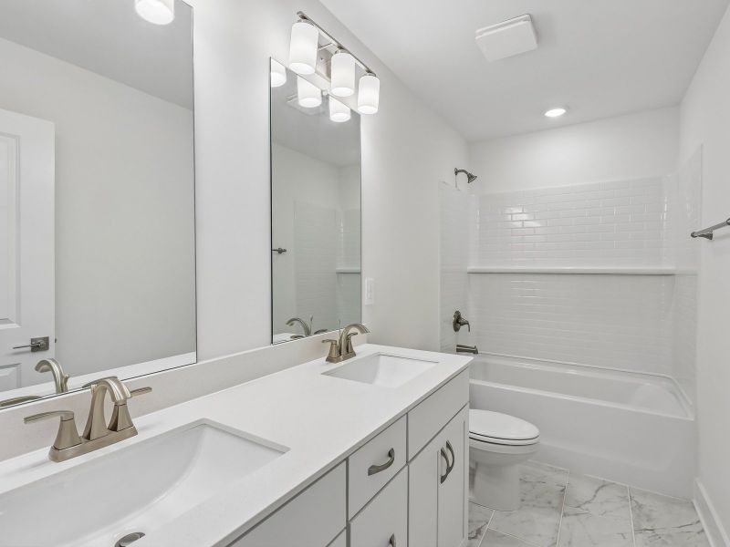 Furnished interior view inside a new home in Station Hill - Estate Series, Franklin (Image 7).