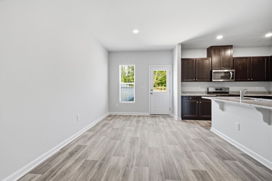 Spacious, unfurnished interior of a new home in Carpenter Falls, Durham (Image 28).