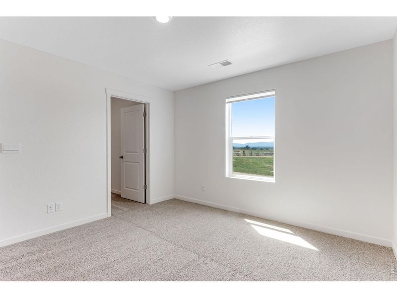 Spacious, unfurnished interior of a new home in Vista Meadows, Fort Lupton (Image 12).