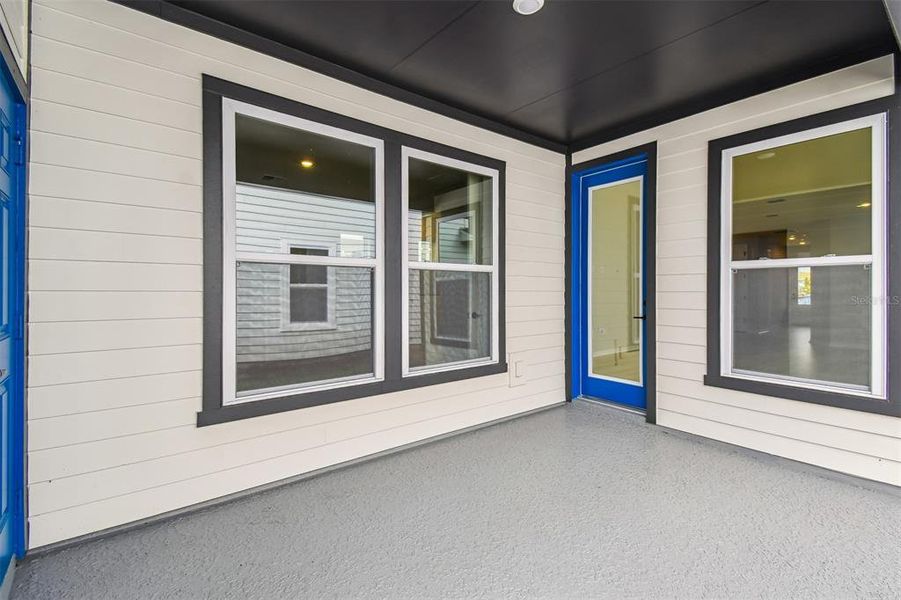 Exterior details and patio area of a home in Weslyn Park in Sunbridge 34', St. Cloud (Image 3).