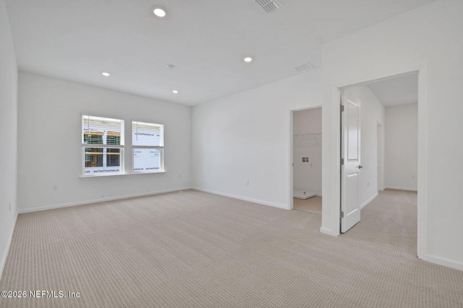 Spacious, unfurnished interior of a new home in TrailMark, St. Augustine (Image 27).