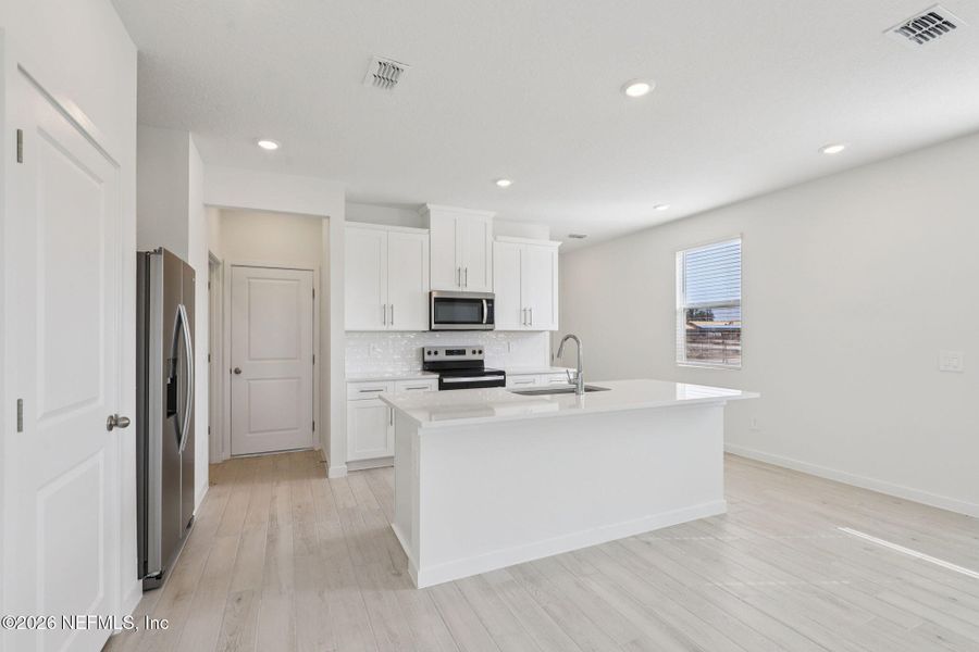 Furnished interior view inside a new home in Parkside at Shearwater, St. Augustine (Image 13).