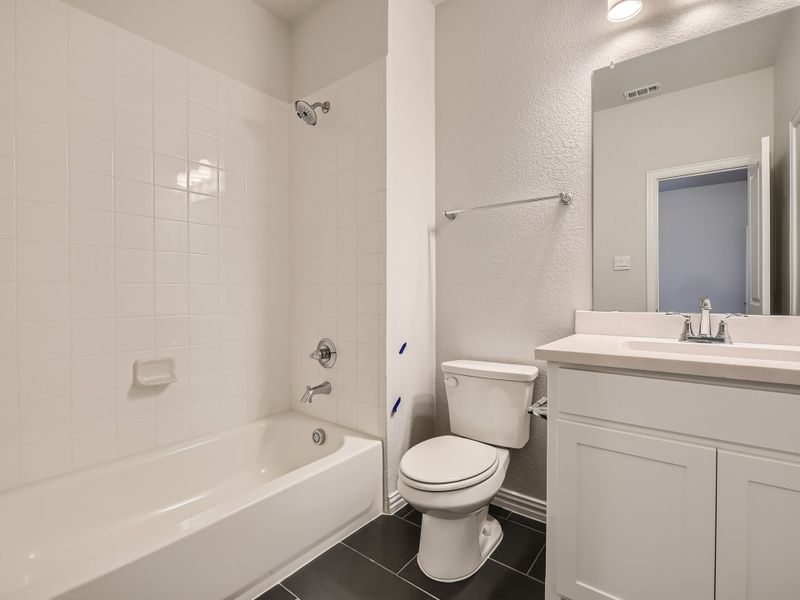 Plan 1533 Secondary Bathroom Representative Photo by American Legend Homes