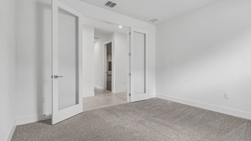 Furnished interior view inside a new home in Ardisia Park, New Smyrna Beach (Image 22).