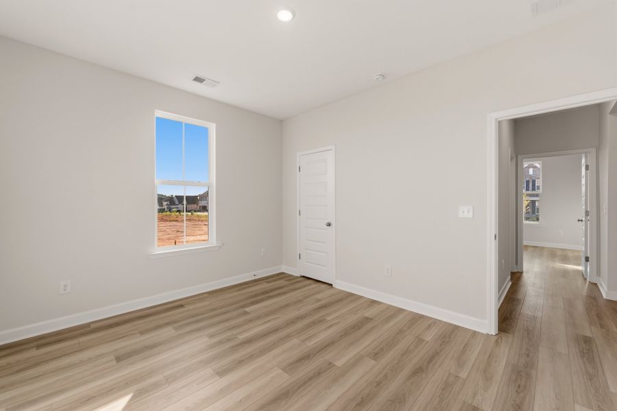 Spacious, unfurnished interior of a new home in Cottages at Lake Emory, Inman (Image 25). Spacious, unfurnished interior of a new home in Cottages at Lake Emory, Inman (Image 25).