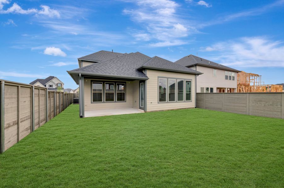Exterior details and patio area of a home in Treeline, Justin (Image 3).
