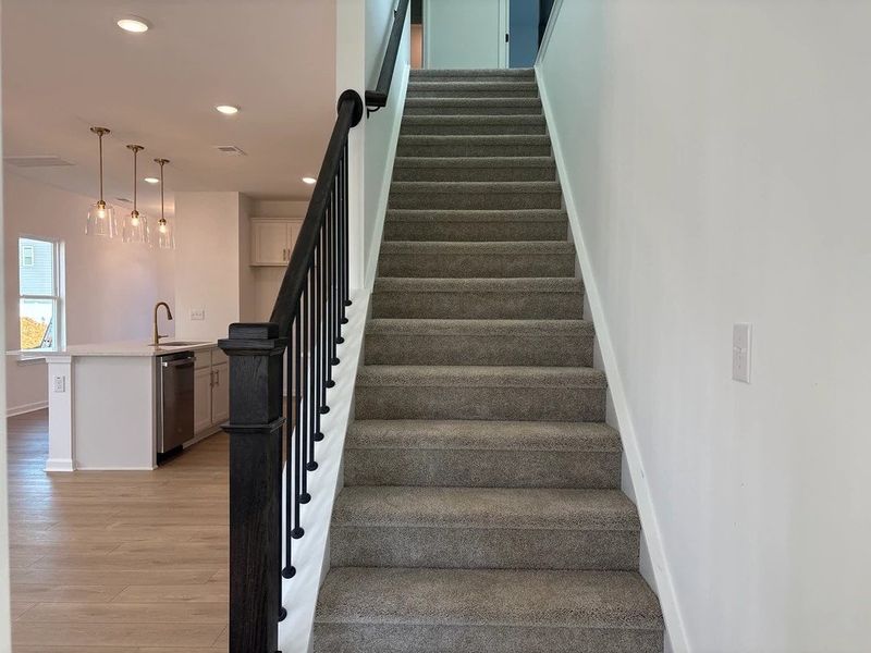 Staircase featuring the AW Collection® Serene - Clean lines and quiet tones lead the way.