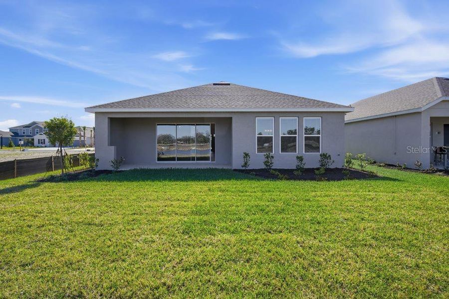 Exterior details and patio area of a home in Firethorn, Parrish (Image 20).