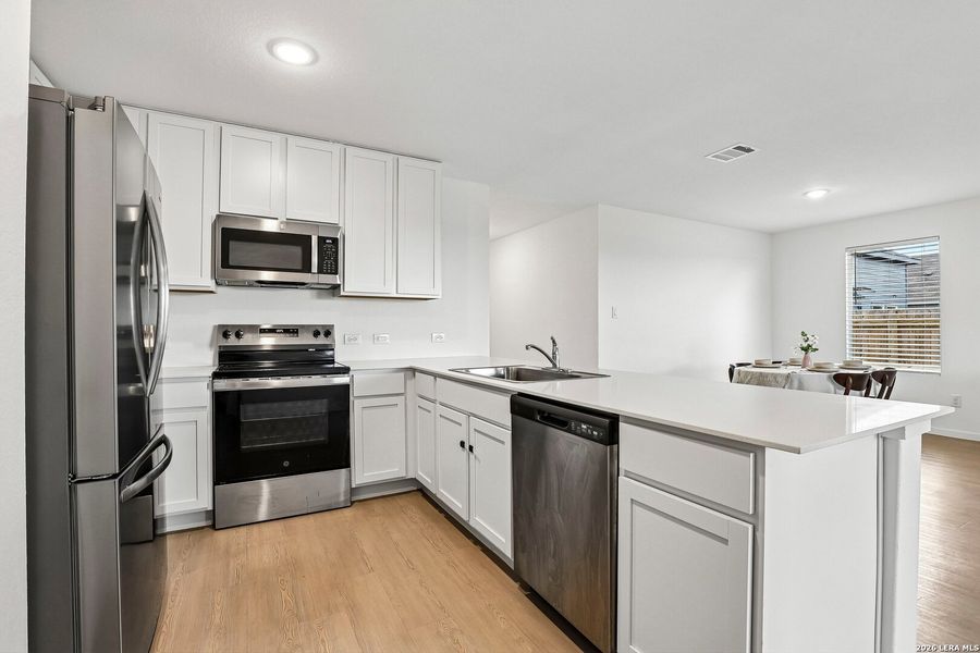 Furnished interior view inside a new home in , Seguin (Image 4).