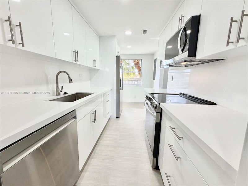 Furnished interior view inside a new home in , Lauderdale Lakes (Image 5).