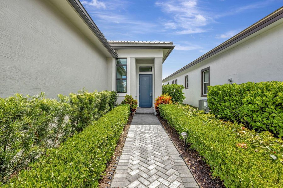 Front exterior of a new home in , Port St. Lucie, FL, highlighting curb appeal (Image 25).