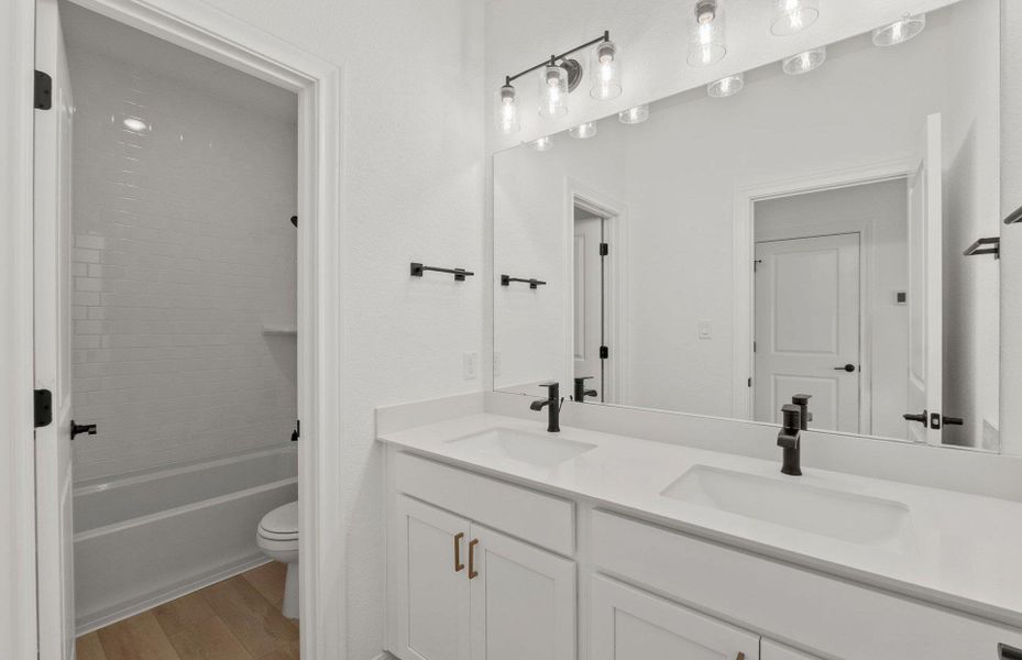 Furnished interior view inside a new home in Saddleback at Santa Rita Ranch, Liberty Hill (Image 8). Furnished interior view inside a new home in Saddleback at Santa Rita Ranch, Liberty Hill (Image 8).