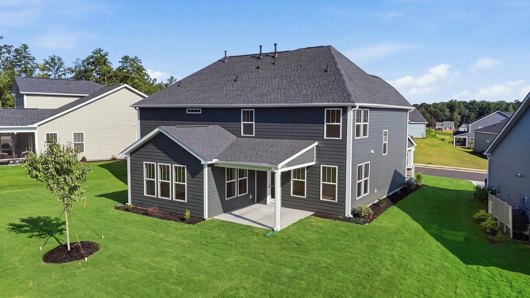 First-class design featuring a rear covered porch and tasteful architectural details