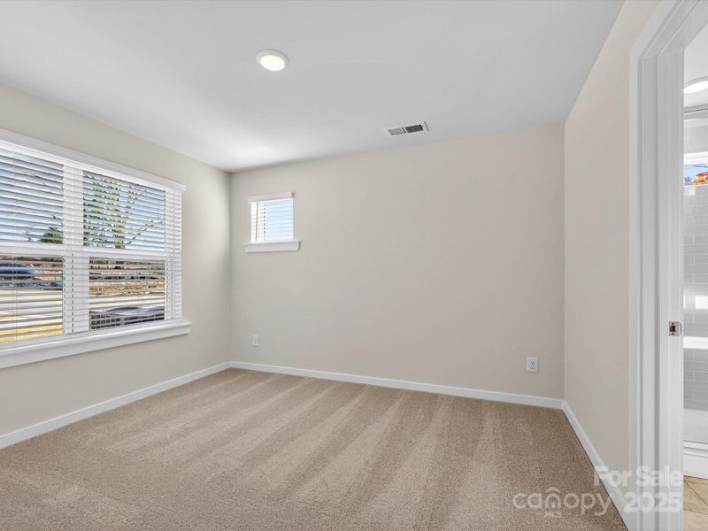 Spacious, unfurnished interior of a new home in Central Living at Craig, Charlotte (Image 13).