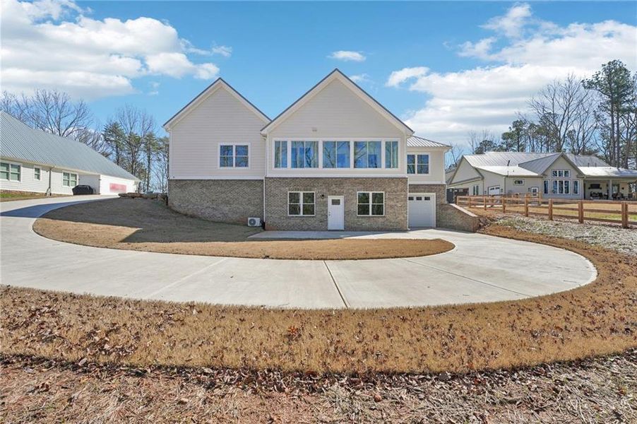 Front exterior of a new home in , Canton, GA, highlighting curb appeal (Image 25).