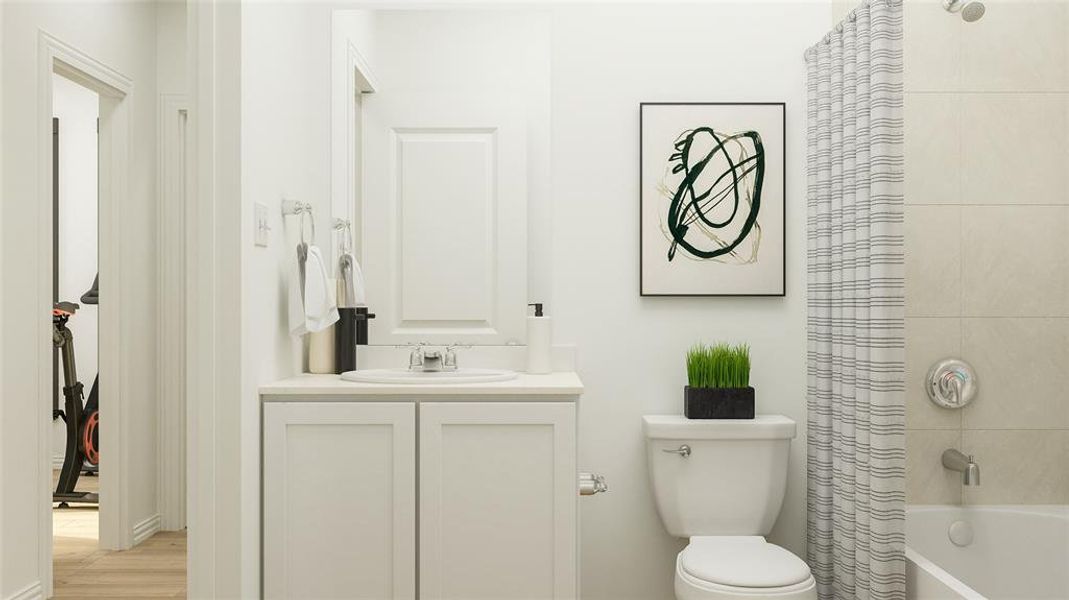 Full bathroom featuring shower / bath combination with curtain, wood-type flooring, toilet, and vanity