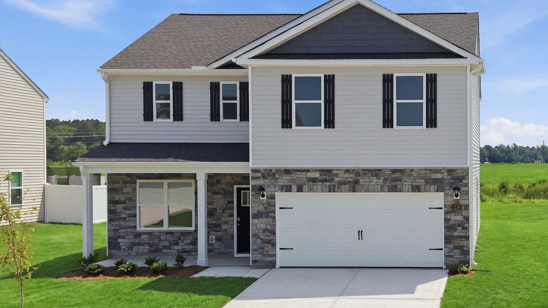 Front exterior of a new home in East Ridge, Ayden, NC, highlighting curb appeal (Image 18).