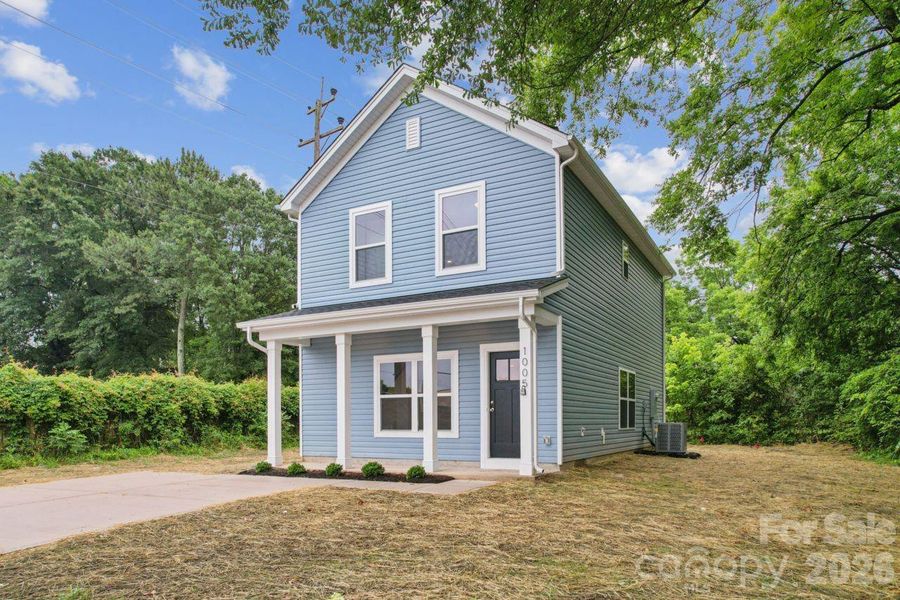 Front exterior of a new home in , Gastonia, NC, highlighting curb appeal (Image 14).