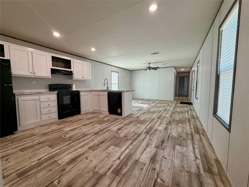 Spacious, unfurnished interior of a new home in , Oyster Creek (Image 8).