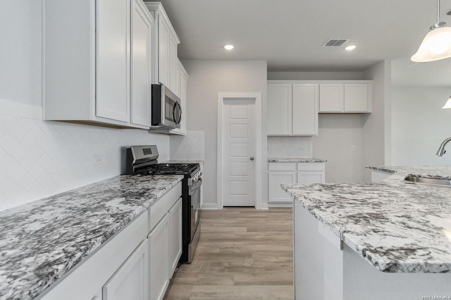 Furnished interior view inside a new home in Lonesome Dove, San Antonio (Image 6). Furnished interior view inside a new home in Lonesome Dove, San Antonio (Image 6).