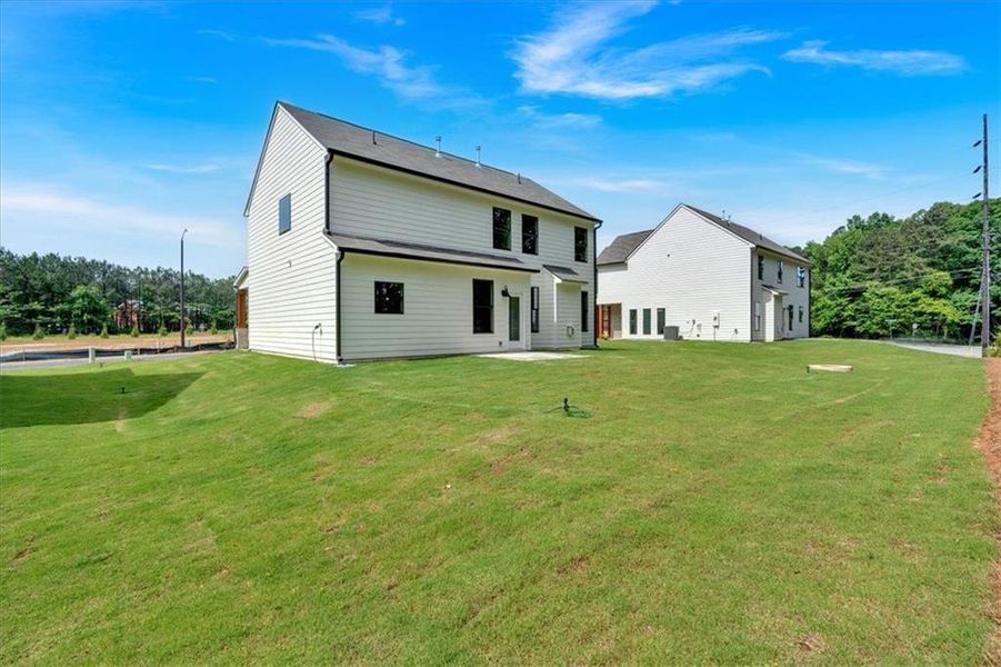 Exterior details and patio area of a home in The Overlook at Factory Shoals, Mableton (Image 19).