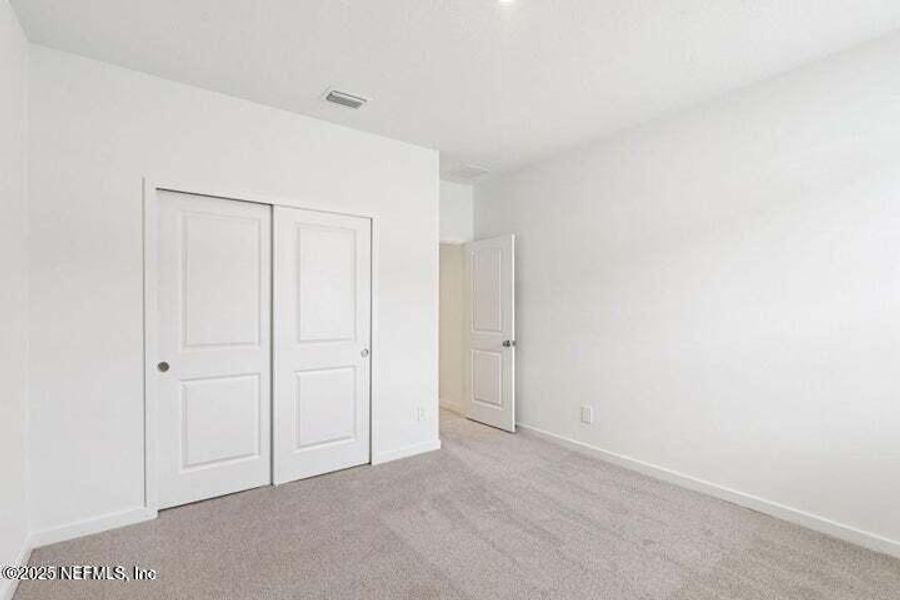 Spacious, unfurnished interior of a new home in Lakes at Bella Lago - Signature Series, Green Cove Springs (Image 32). Spacious, unfurnished interior of a new home in Lakes at Bella Lago - Signature Series, Green Cove Springs (Image 32).