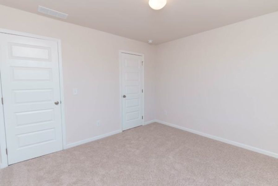 Representative unfurnished interior of a home built from the Clayton by Piedmont Residential in Hampton Ridge, Jefferson (Image 45).
