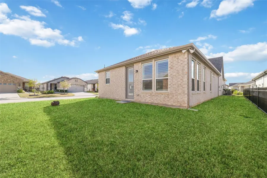 Exterior details and patio area of a home in , Willis (Image 3). Exterior details and patio area of a home in , Willis (Image 3).