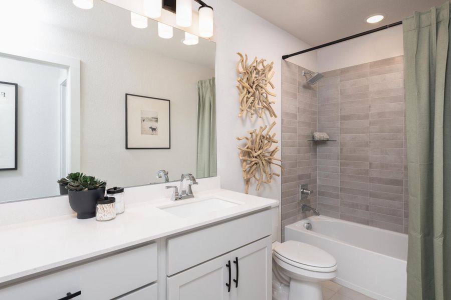 Representative furnished interior of a home built from the Winfield by Tri Pointe Homes in Prairie Collection at The Meadows, Krum (Image 16).
